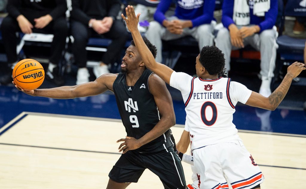 North Alabama Lions guard Taye Fields (9) goes up for a layup as Auburn Tigers take on North Alabama Lions at Neville Arena in Auburn, Ala., on Monday, Nov. 18, 2024. Auburn Tigers defeated North Alabama Lions 102-69.