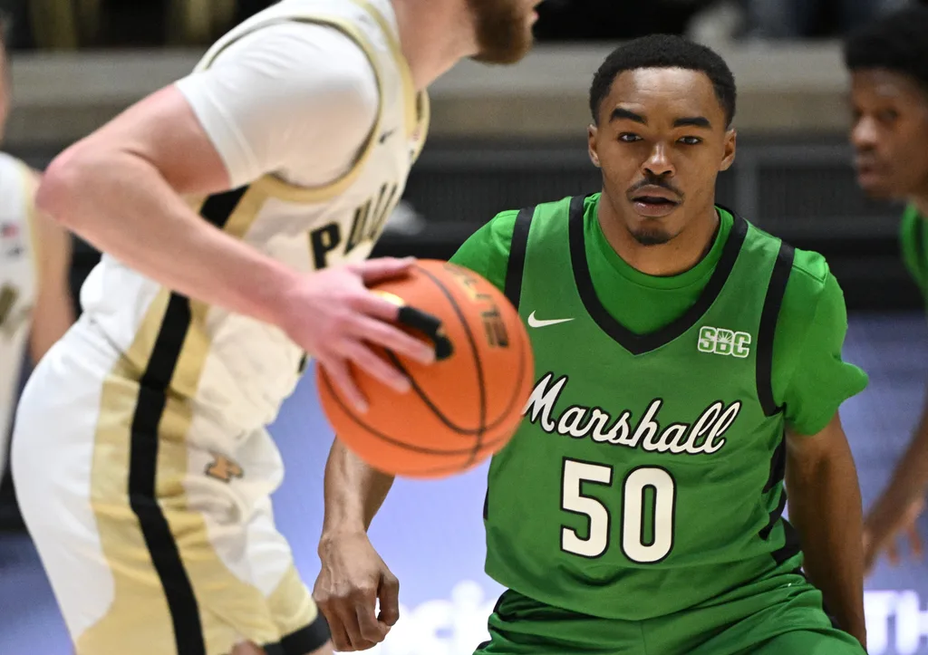 Nov 23, 2024; West Lafayette, Indiana, USA; Marshall Thundering Herd guard Jalen Speer (50) looks at a ball controlled by Purdue Boilermakers guard Braden Smith (3) during the first half at Mackey Arena. Mandatory Credit: Marc Lebryk-Imagn Images