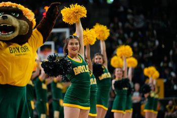 Jan 19, 2025; Waco, Texas, USA;  The Baylor Bear Cheerleaders perform during a break in play against the TCU Horned Frogs during the first half at Paul and Alejandra Foster Pavilion. Mandatory Credit: Chris Jones-Imagn Images