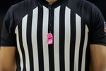 Feb 1, 2025; Berkeley, California, USA; Referee Mark Schnur wears a pink whistle to raise awareness for cancer research during the first half of the game between the California Golden Bears and the Syracuse Orange at Haas Pavilion. Mandatory Credit: Robert Edwards-Imagn Images