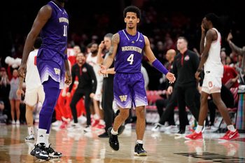 Washington Huskies guard DJ Davis (4) reacts during the NCAA men's basketball game against the Ohio State Buckeyes at Value City Arena in Columbus on Feb. 13, 2025. Ohio State won 93-69.