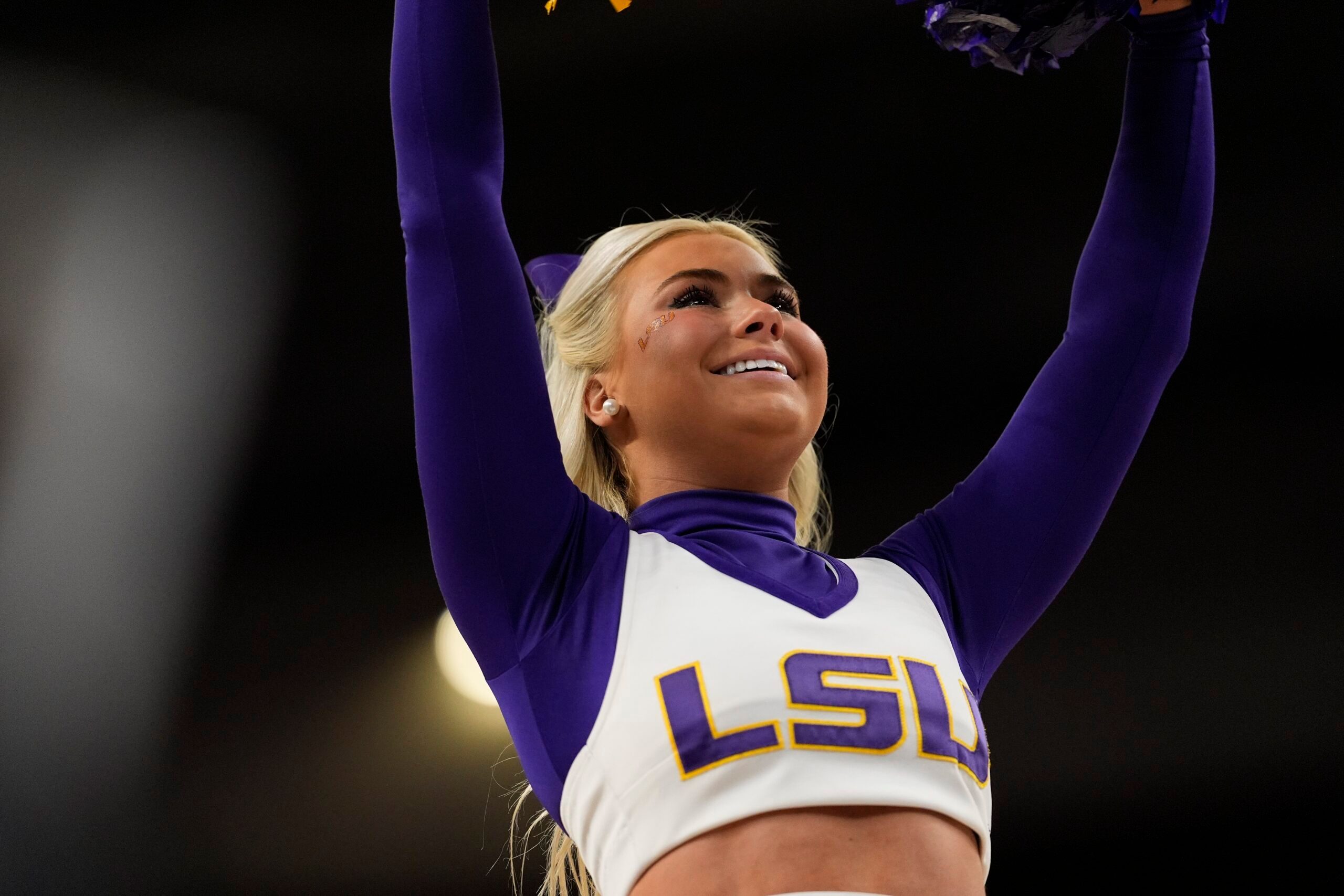 Mar 7, 2025; Greenville, SC, USA; LSU Lady Tigers cheerleader during the first half against the Florida Gators at Bon Secours Wellness Arena. Mandatory Credit: Jim Dedmon-Imagn Images