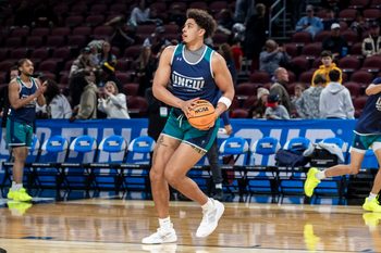Mar 19, 2025; Wichita, KS, USA;  UNC-Wilmington Seahawks forward Harlan Obioha (55) drives toward the basket during a practice session at Intrust Bank Arena. Mandatory Credit: Nick Tre. Smith-Imagn Images