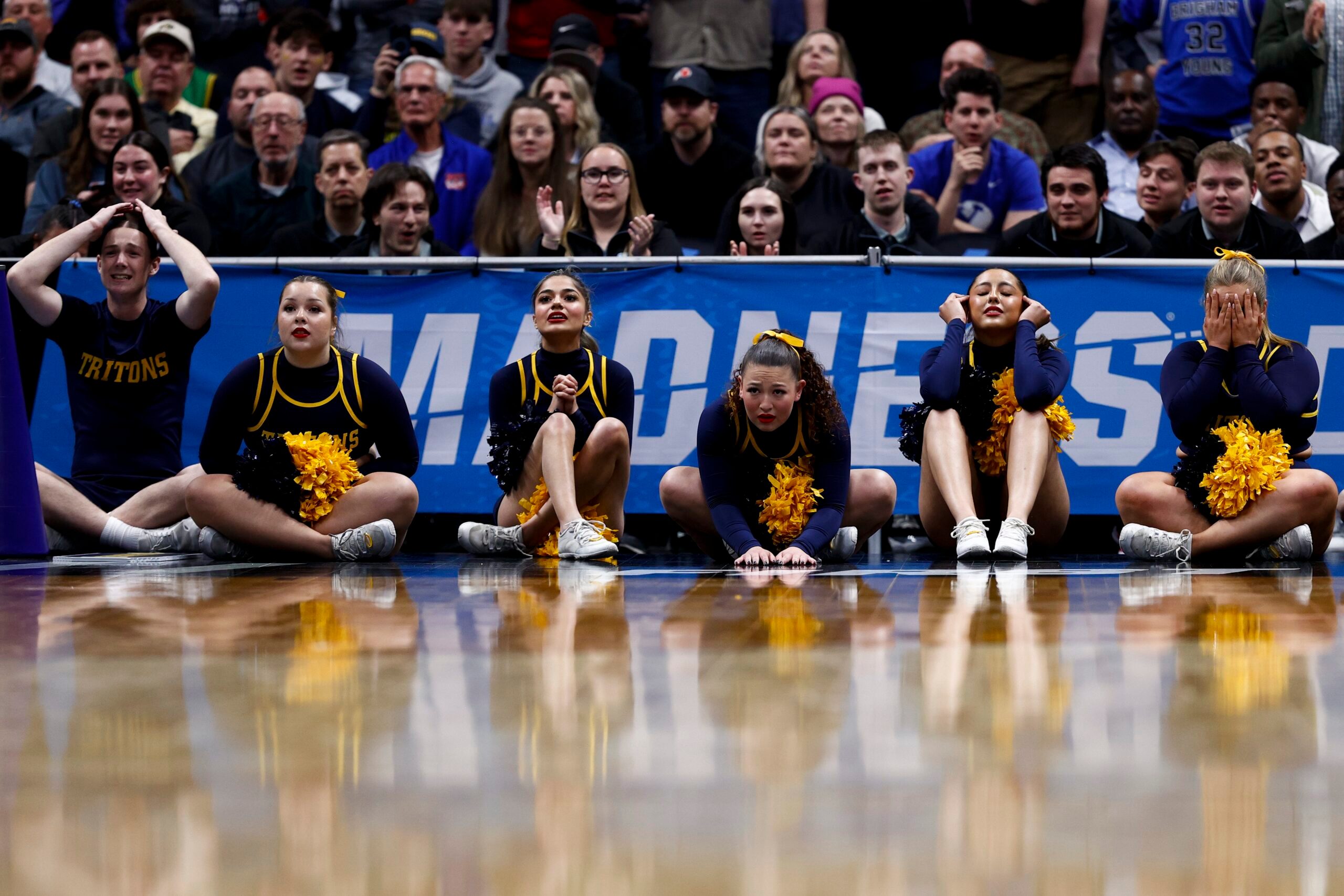 March 20, 2025; Denver, CO, USA; UC San Diego Tritons cheerleaders reacts during the second half against the Michigan Wolverines at Ball Arena. Mandatory Credit: Isaiah J. Downing-Imagn Images