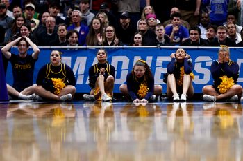 March 20, 2025; Denver, CO, USA; UC San Diego Tritons cheerleaders reacts during the second half against the Michigan Wolverines at Ball Arena. Mandatory Credit: Isaiah J. Downing-Imagn Images