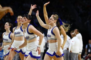 Mar 22, 2025; Wichita, KS, USA; Drake Bulldogs cheerleaders perform during the first half at Intrust Bank Arena. Mandatory Credit: Nick Tre. Smith-Imagn Images
