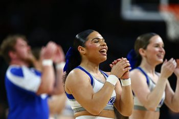 Mar 22, 2025; Wichita, KS, USA; Drake Bulldogs cheerleaders perform during the second half at Intrust Bank Arena. Mandatory Credit: Nick Tre. Smith-Imagn Images