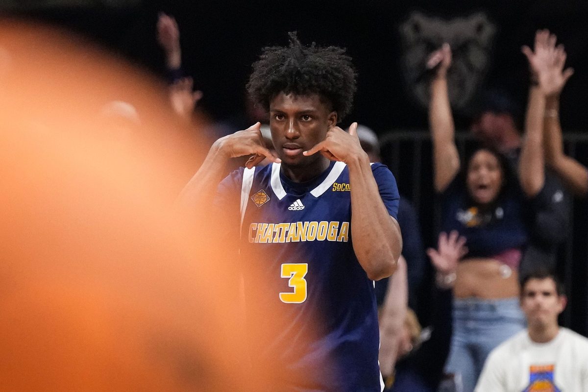 Chattanooga Mocs guard Honor Huff (3) celebrat4es scoring a three point basket Thursday, April 3, 2025, during the National Invitional Tournament at Hinkle Fieldhouse in Indianapolis.