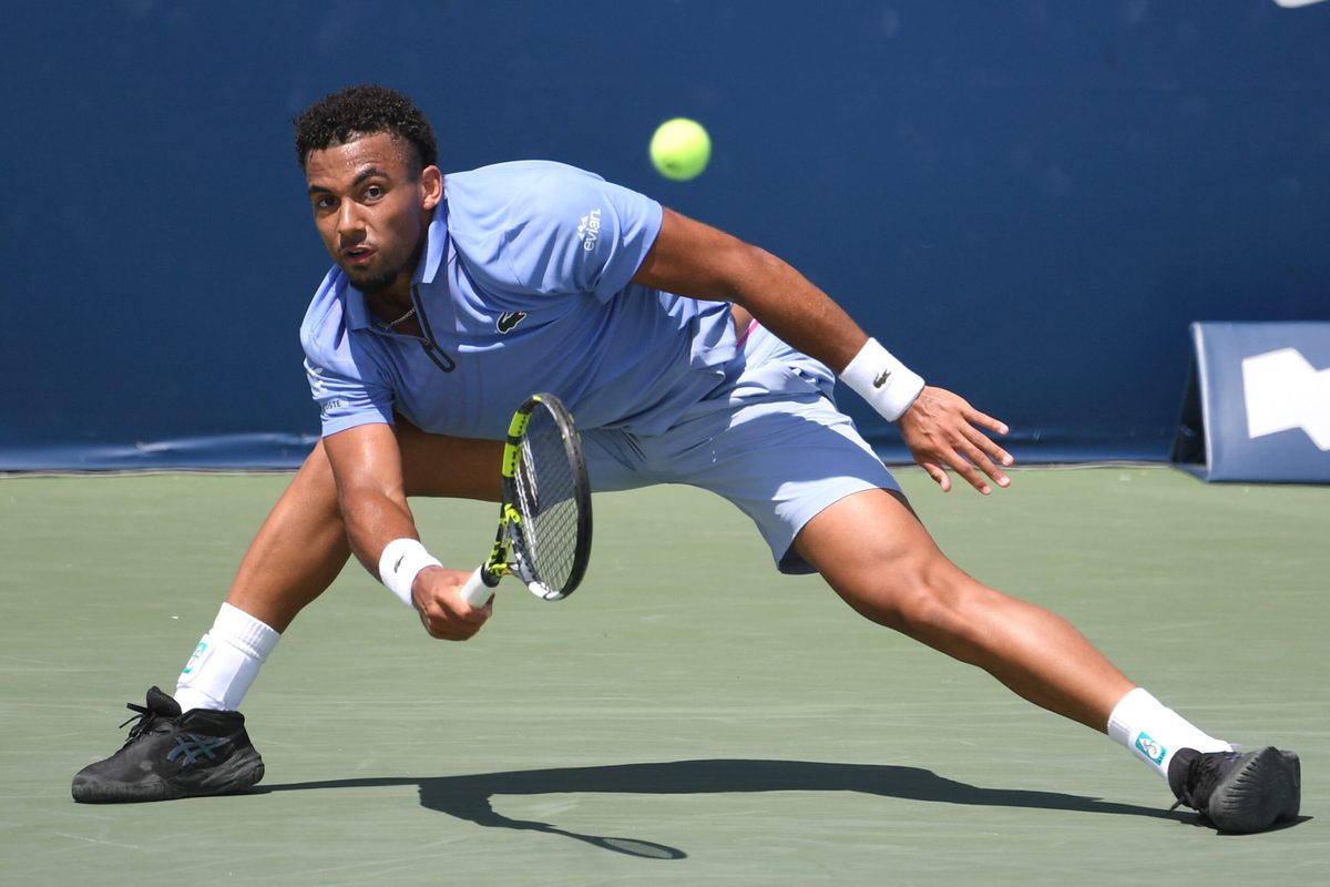 Aug 1, 2025; Toronto, ON, Canada; Jiri Lehecka (CZE) plays a shot against Arthur Fils (FRA) during third round play at Sobeys Stadium. Mandatory Credit: Dan Hamilton-Imagn Images
