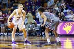 Northern Iowa guard A.J. Green looks around the court while being defended by Southern Illinois guard Aaron Cook (10) during a NCAA Missouri Valley Conference men's basketball game on Saturday, Jan. 5, 2019, at the McLeod Center in Cedar Falls, Iowa.

190105 Uni S Illinois 028 Jpg
