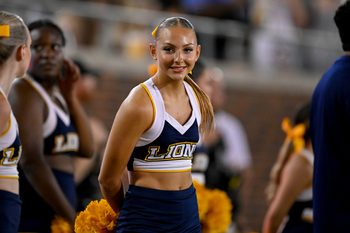 Aug 30, 2025; Dallas, Texas, USA; A East Texas A&M Lions cheerleader looks on during the second half against the Southern Methodist Mustangs at Gerald J. Ford Stadium. Mandatory Credit: Jerome Miron-Imagn Images