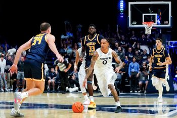 Xavier Musketeers guard Roddie Anderson III (0) drives the ball down the court in the second half of a NCAA men’s basketball game between the Xavier Musketeers and Murray State Racers, Saturday, Oct. 18, 2025, at Cintas Center in Cincinnati. Racers won 75-70.