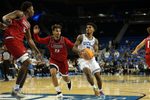 Nov 3, 2025; Los Angeles, California, USA;  UCLA Bruins guard Donovan Dent (2) drives to the basket against Eastern Washington Eagles guard Jojo Anderson (22) during the second half at Pauley Pavilion presented by Wescom Financial. Mandatory Credit: Kiyoshi Mio-Imagn Images