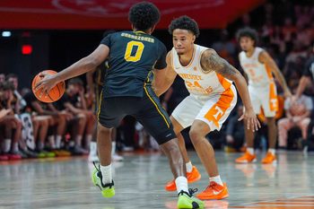 Tennessee guard Troy Henderson (24) guards Northern Northern Kentucky guard Dan Gherezgher (0) during a NCAA basketball game between the Tennessee Volunteers and Northern Kentucky Norse at Thompson-Boling Arena at Food City Center on Nov. 8, 2025.
