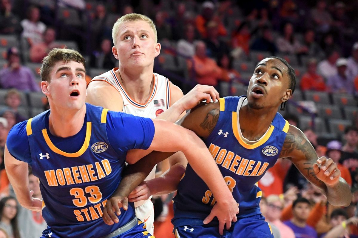 Morehead State Eagles forward Clayton Parker (33) and Morehead State Eagles guard George Marshall (3) box out Clemson Tigers forward Chase Thompson (3) Tuesday, Nov. 11, 2025, during the NCAA men’s basketball game at Littlejohn Coliseum in Clemson, South Carolina. Clemson Tigers won 83-56.