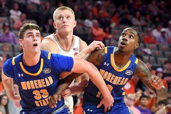 Morehead State Eagles forward Clayton Parker (33) and Morehead State Eagles guard George Marshall (3) box out Clemson Tigers forward Chase Thompson (3) Tuesday, Nov. 11, 2025, during the NCAA men’s basketball game at Littlejohn Coliseum in Clemson, South Carolina. Clemson Tigers won 83-56.