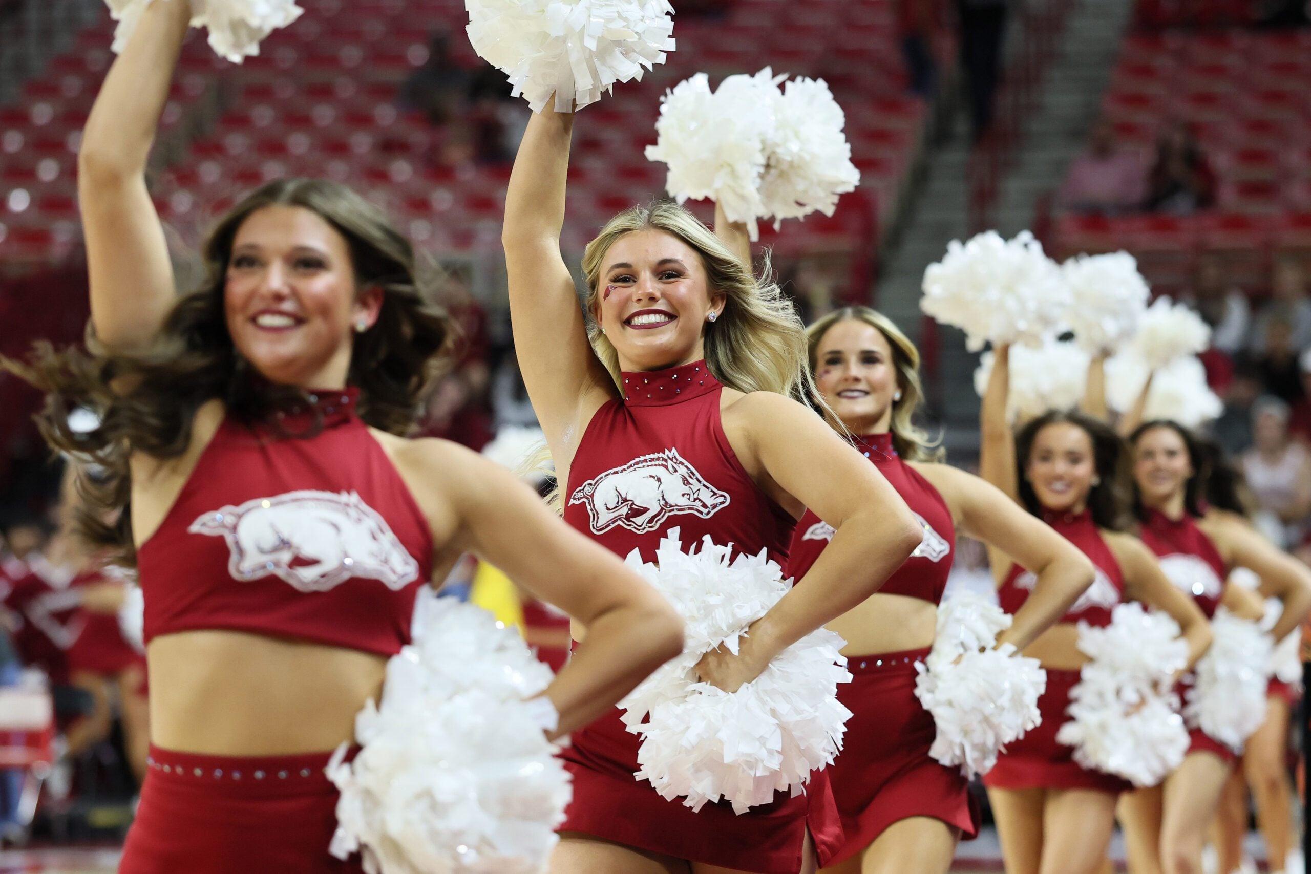 Nov 14, 2025; Fayetteville, Arkansas, USA; Arkansas Razorbacks cheerleaders prior to the game against the Samford Bulldogs at Bud Walton Arena. Mandatory Credit: Nelson Chenault-Imagn Images