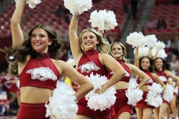Nov 14, 2025; Fayetteville, Arkansas, USA; Arkansas Razorbacks cheerleaders prior to the game against the Samford Bulldogs at Bud Walton Arena. Mandatory Credit: Nelson Chenault-Imagn Images