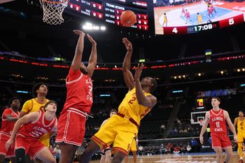 Nov 14, 2025; Inglewood, California, USA;  Southern California Trojans forward Ezra Ausar (2) shoots the ball over Illinois State Redbirds forward Chase Walker (35) during the first half of the Hall of Fame Series game at Intuit Dome. Mandatory Credit: Kiyoshi Mio-Imagn Images