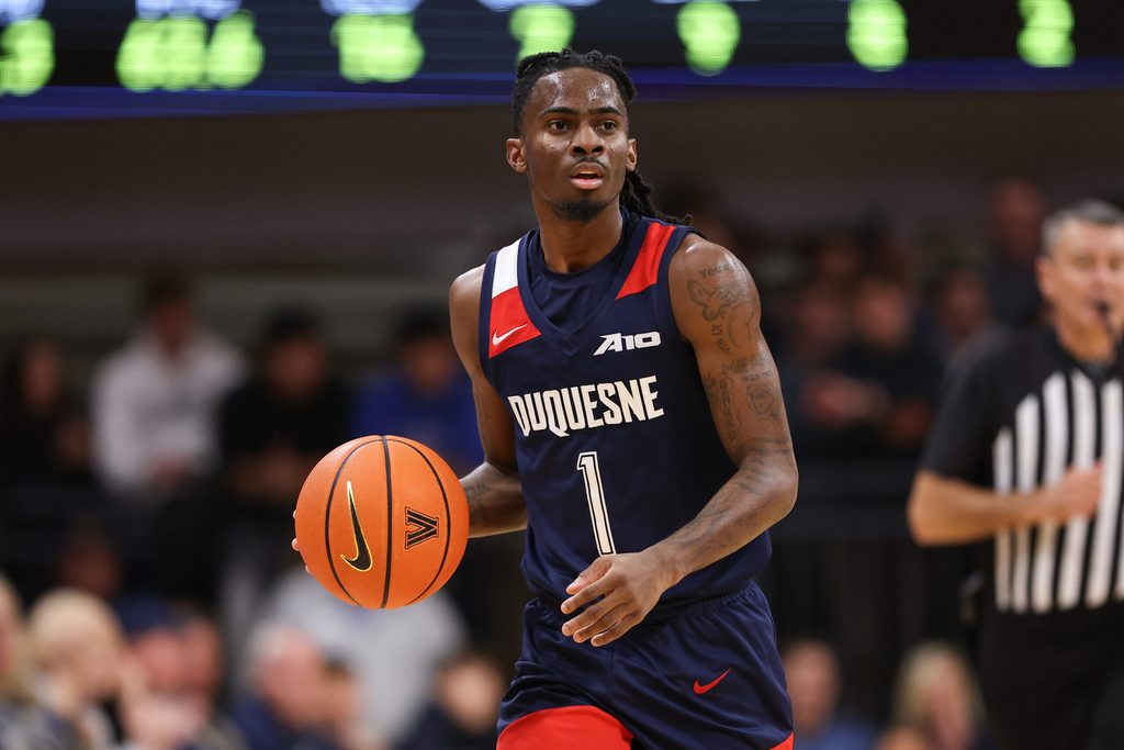 Nov 15, 2025; Villanova, Pennsylvania, USA; Duquesne Dukes guard Tarence Guinyard (1) dribbles up court against the Villanova Wildcats during the second half at William B. Finneran Pavilion. Mandatory Credit: Bill Streicher-Imagn Images
