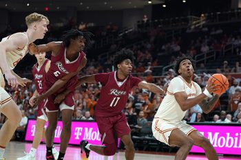 Nov 18, 2025; Austin, Texas, USA; Texas Longhorns guard Dailyn Swain (3) drives the ball to the basket against Rider Broncs guard Flash Burton (11) during the first half at Moody Center. Mandatory Credit: Dustin Safranek-Imagn Images