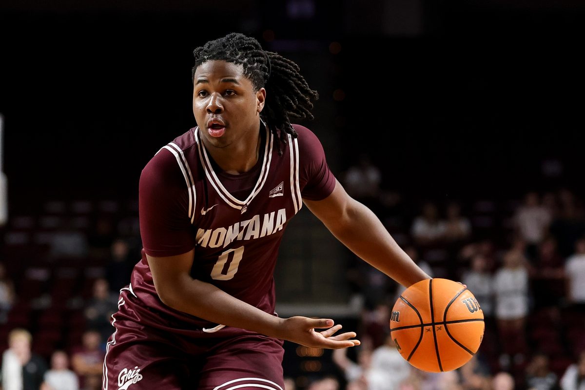 Nov 18, 2025; College Station, Texas, USA; Montana Grizzlies guard Money Williams (0) looks to pass the ball during the second half against the Texas A&M Aggies at Reed Arena. Mandatory Credit: Maria Lysaker-Imagn Images