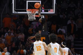 Nov 20, 2025; Knoxville, Tennessee, USA;  Tennessee State Tigers guard Travis Harper II (2) dunks the ball against the Tennessee Volunteers during the first half at Thompson-Boling Arena at Food City Center. Mandatory Credit: Randy Sartin-Imagn Images