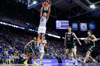 Nov 21, 2025; Lexington, Kentucky, USA; Kentucky Wildcats guard Collin Chandler (5) dunks the ball during the second half against the Loyola (MD) Greyhounds at Rupp Arena at Central Bank Center. Mandatory Credit: Jordan Prather-Imagn Images