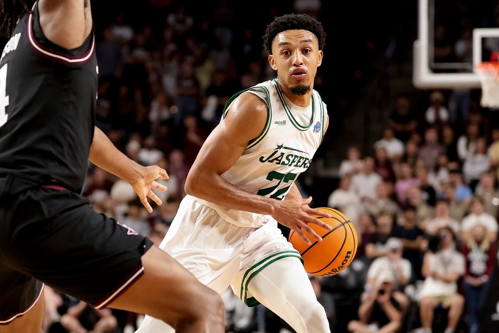 Nov 21, 2025; College Station, Texas, USA; Manhattan Jaspers guard Terrance Jones (22) looks to pass the ball during the second half against the Texas A&M Aggies at Reed Arena. Mandatory Credit: Maria Lysaker-Imagn Images
