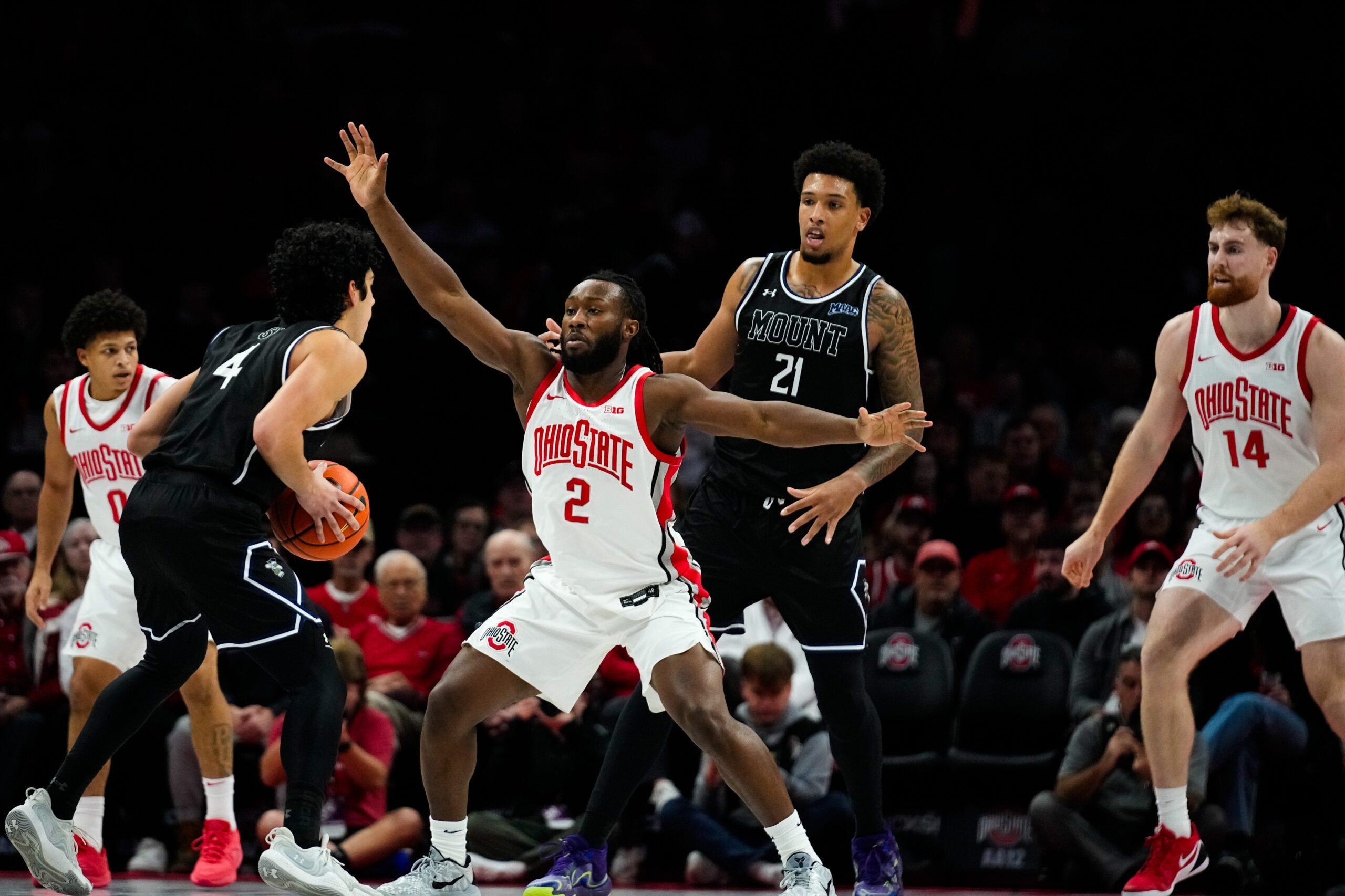Ohio State Buckeyes guard John Mobley Jr. (0), guard Bruce Thornton (2) and forward Brandon Noel (14) play defense against the Mount St. Mary's Mountaineers in the first half of the NCAA basketball game at Value City Arena on Tuesday, Nov. 25, 2025 in Columbus, Ohio.