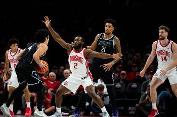 Ohio State Buckeyes guard John Mobley Jr. (0), guard Bruce Thornton (2) and forward Brandon Noel (14) play defense against the Mount St. Mary's Mountaineers in the first half of the NCAA basketball game at Value City Arena on Tuesday, Nov. 25, 2025 in Columbus, Ohio.