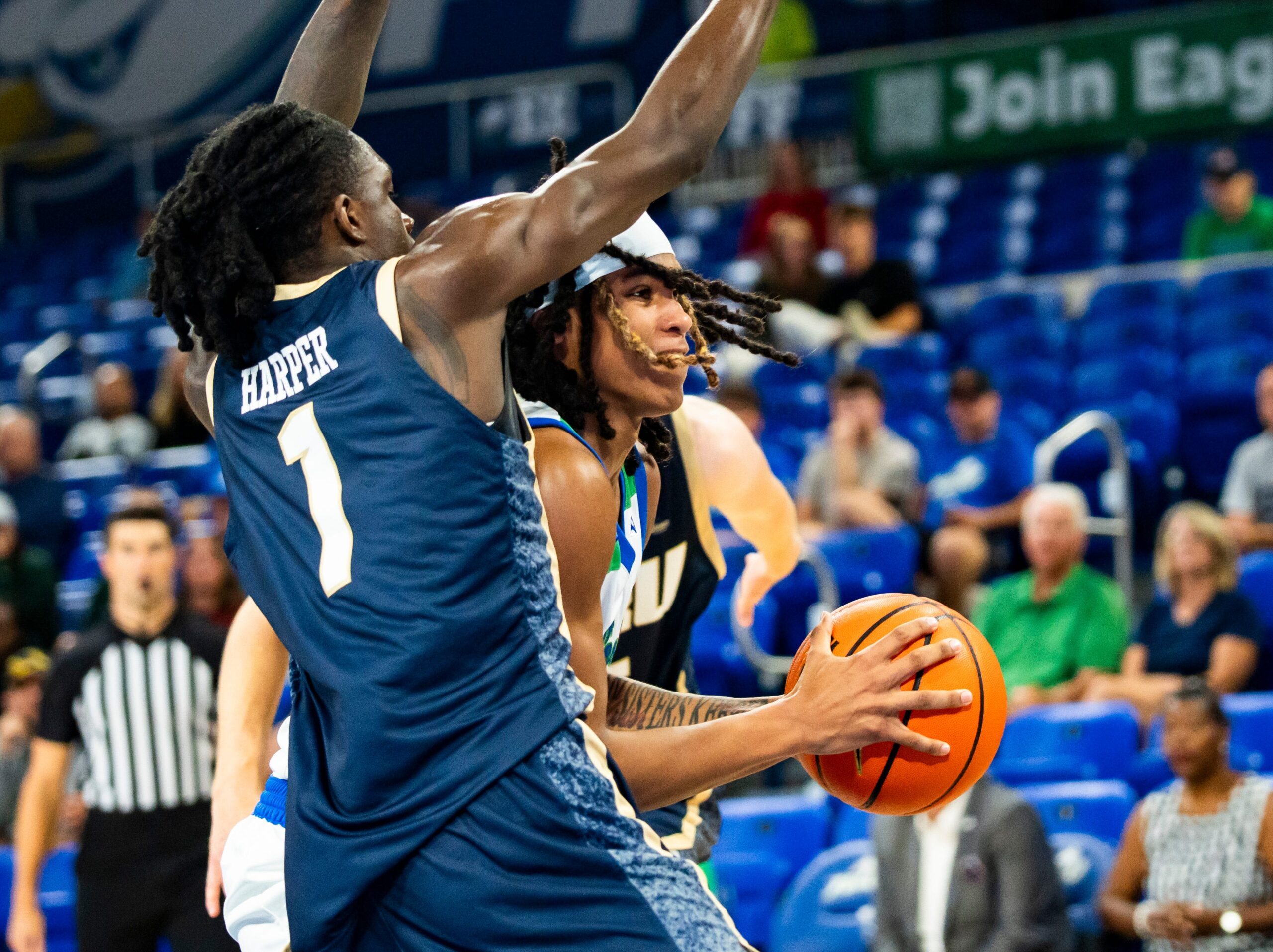 The Florida Gulf Coast Eagles compete against the Oral Roberts Golden Eagles in a GEICO Coconut Hoops Tournament Tarpon Bay division game at Alico Arena on Fort Myers, Fla., on Monday, Nov. 24, 2025. Jordan Ellerbee drives to the hoop.