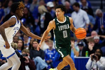 Nov 21, 2025; Lexington, Kentucky, USA; Loyola (MD) Greyhounds guard Braeden Speed (0) handles the ball during the second half against the Kentucky Wildcats at Rupp Arena at Central Bank Center. Mandatory Credit: Jordan Prather-Imagn Images