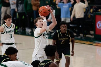 Dec 2, 2025; Waco, Texas, USA; Baylor Bears guard Will Kuykendall (2) scores a free-throw against the Sacramento State Hornets  during the second half at Paul and Alejandra Foster Pavilion. Mandatory Credit: Chris Jones-Imagn Images