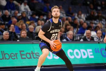 Dec 3, 2025; Memphis, Tennessee, USA; New Orleans Privateers guard Coleton Benson (22) looks to shoot the ball against the Memphis Tigers during the second half at FedExForum. Mandatory Credit: Wesley Hale-Imagn Images