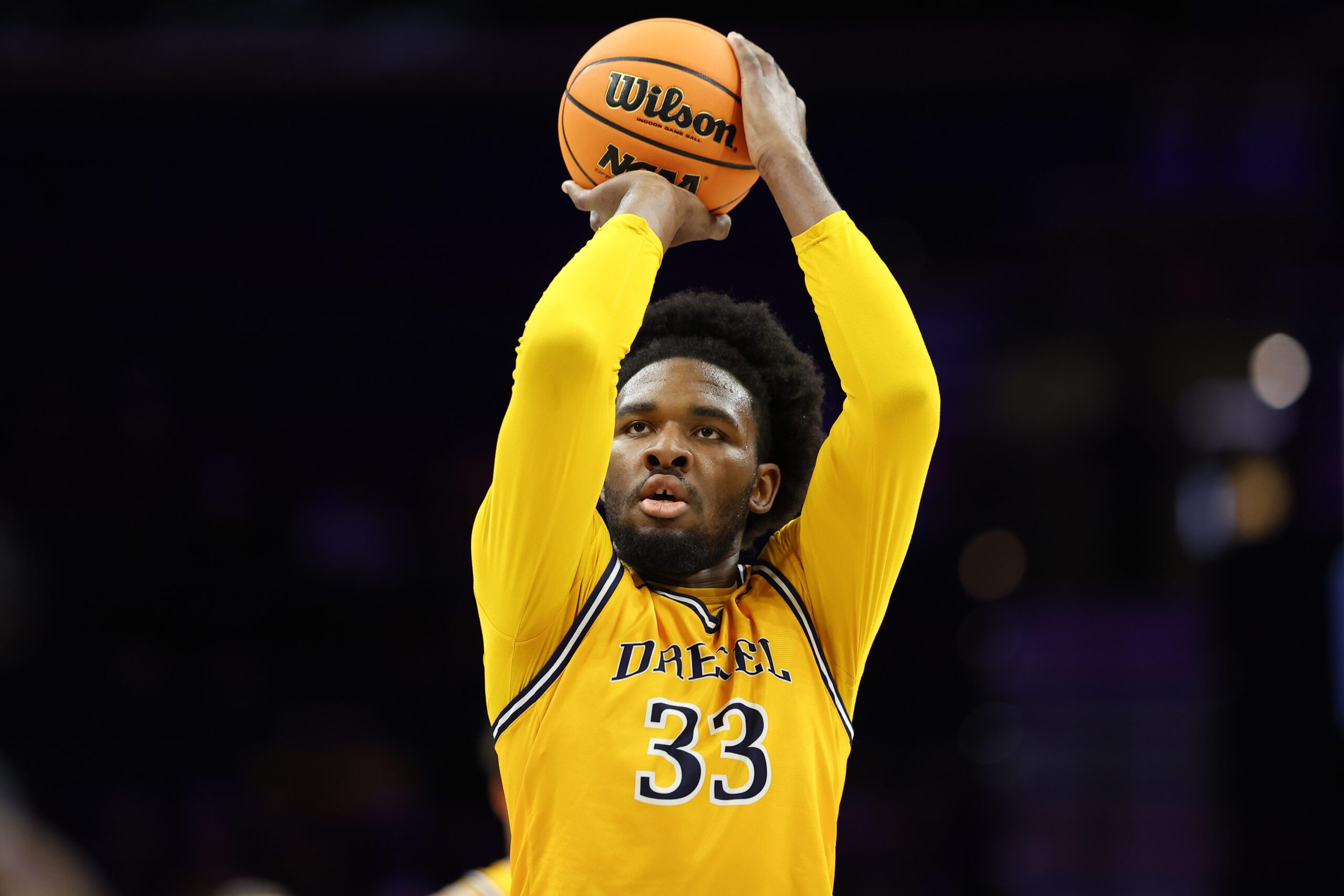 Dec 6, 2025; Philadelphia, PA, USA; Drexel Dragons forward Ralph Akuta (33) shoots a foul shot against the La Salle Explorers during the first half at Xfinity Mobile Arena. Mandatory Credit: Bill Streicher-Imagn Images