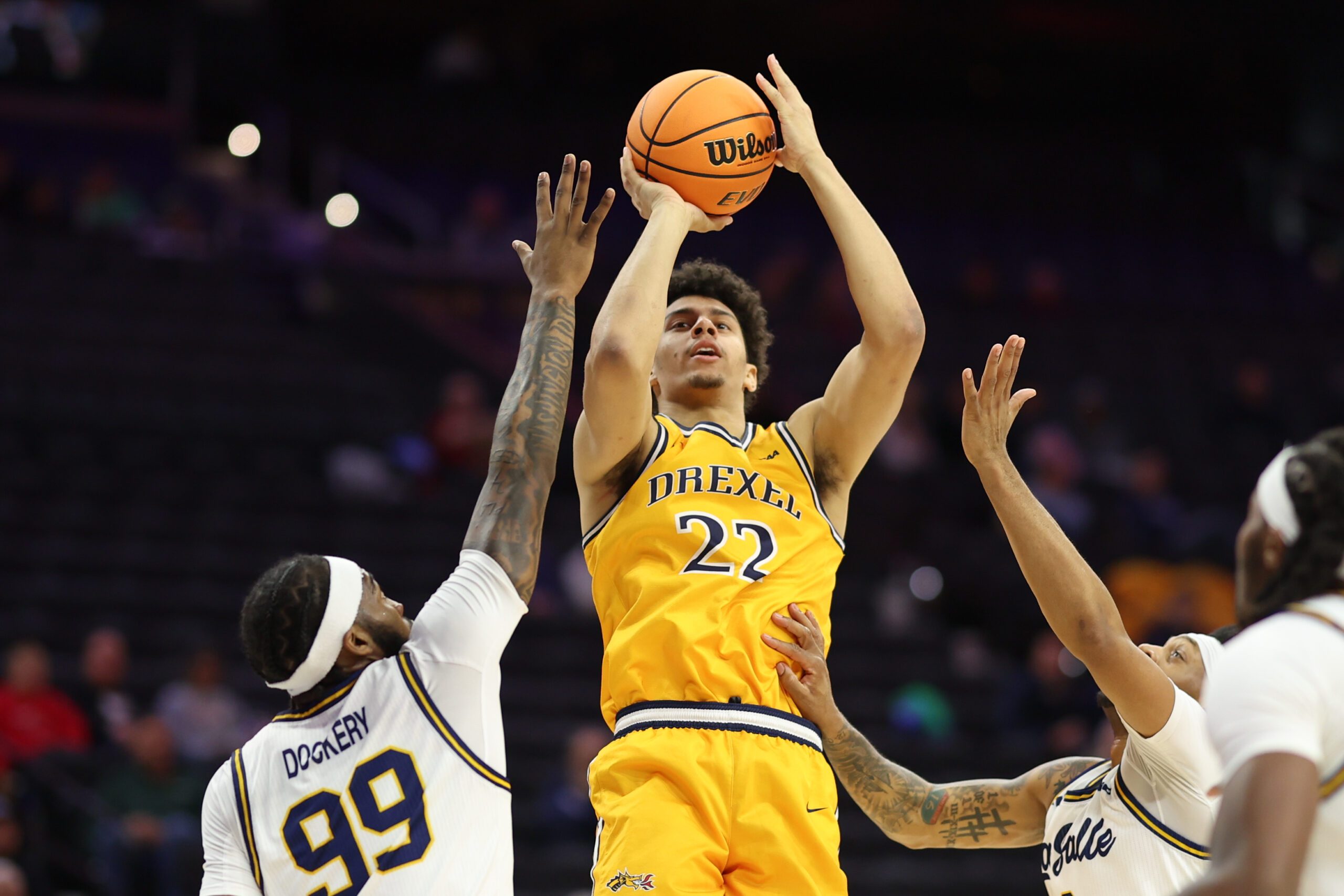 Dec 6, 2025; Philadelphia, PA, USA; Drexel Dragons guard Villiam Garcia Adsten (22) shoots against the La Salle Explorers during the first half at Xfinity Mobile Arena. Mandatory Credit: Bill Streicher-Imagn Images