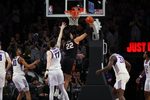Dec 6, 2025; Phoenix, Arizona, USA; Oklahoma State Cowboys forward Parsa Fallah (22) makes a layup against the Grand Canyon Lopes at PHX Arena. Mandatory Credit: Anna Carrington-Imagn Images