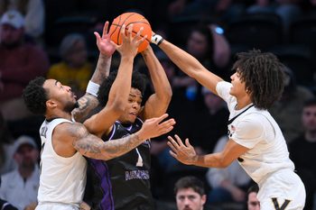 Dec 13, 2025; Nashville, Tennessee, USA; Vanderbilt Commodores guard Frankie Collins (1) and guard Tyler Tanner (3) trap Central Arkansas Bears guard Camren Hunter (1)  during the second half at Memorial Gymnasium. Mandatory Credit: Steve Roberts-Imagn Images