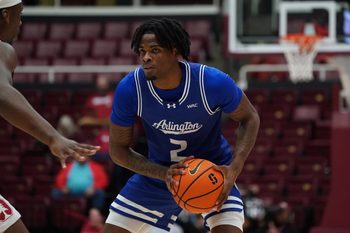 Dec 17, 2025; Stanford, California, USA;  Texas-Arlington Mavericks forward Raysean Seamster (2) looks to pass against the Stanford Cardinal in the first half at Maples Pavilion. Mandatory Credit: David Gonzales-Imagn Images