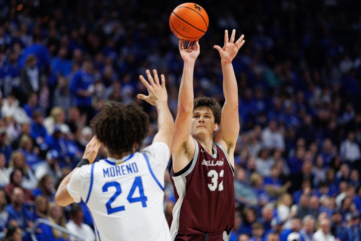 Dec 23, 2025; Lexington, Kentucky, USA; Bellarmine Knights forward Jack Karasinski (32) shoots the ball against Kentucky Wildcats center Malachi Moreno (24) during the first half at Rupp Arena at Central Bank Center. Mandatory Credit: Jordan Prather-Imagn Images
