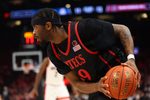 Dec 20, 2025; Phoenix, Arizona, USA; San Diego State Aztecs guard Reese Dixon-Waters (39) against the Arizona Wildcats during the Hall of Fame Series at Mortgage Matchup Center. Mandatory Credit: Mark J. Rebilas-Imagn Images