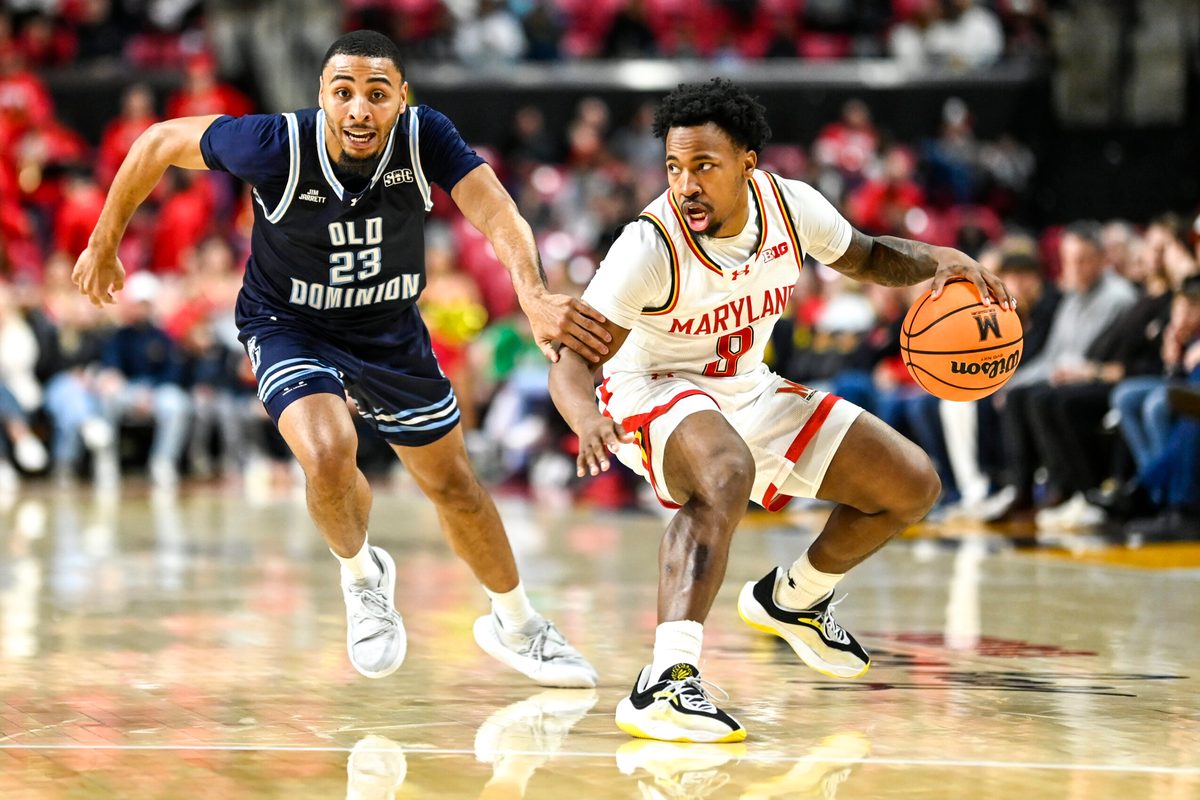 Dec 28, 2025; College Park, Maryland, USA; Maryland Terrapins guard David Coit (8) dribbles as Old Dominion Monarchs guard Jordan Battle (23) defends during the second half at Xfinity Center. Mandatory Credit: Tommy Gilligan-Imagn Images