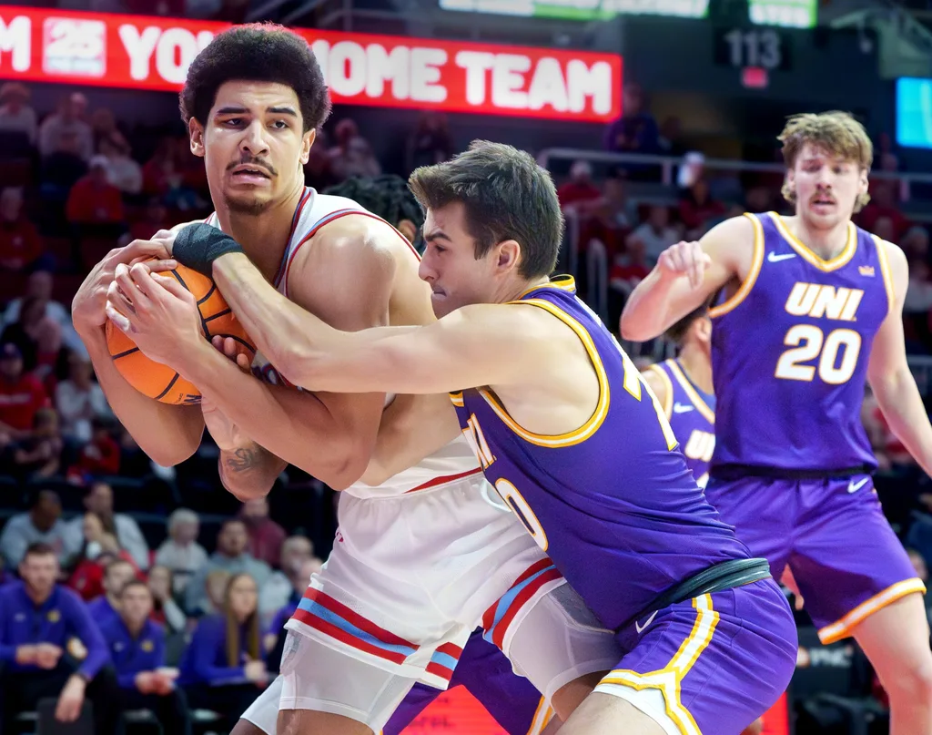 Bradley’s AJ Smith, left, tangles with Northern Iowa’s RJ Taylor in the first half of their college basketball game Saturday, Jan. 10, 2026 at Carver Arena in Peoria. The Braves defeated the Panthers 75-69.