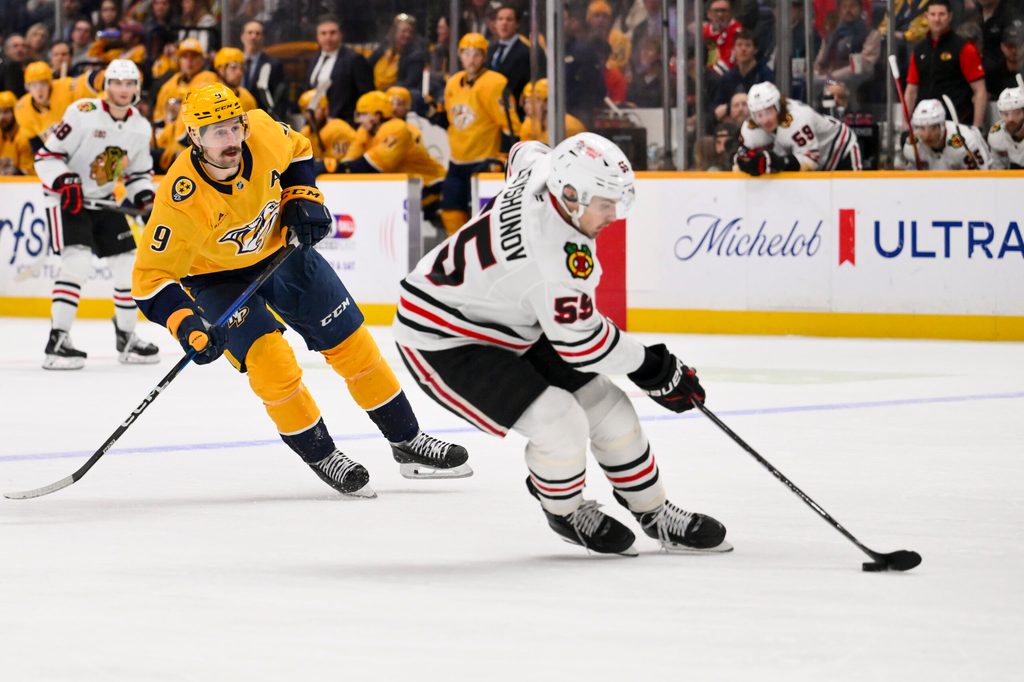 Jan 10, 2026; Nashville, Tennessee, USA; Chicago Blackhawks left wing Tyler Bertuzzi (59) skates with the puck against the Nashville Predators during the third period at Bridgestone Arena. Mandatory Credit: Steve Roberts-Imagn Images