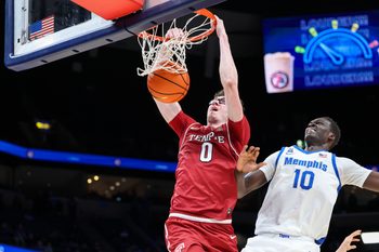 Jan 14, 2026; Memphis, Tennessee, USA; Temple Owls guard Gavin Griffiths (0) dunks the ball against the Memphis Tigers during the second half at FedExForum. Mandatory Credit: Wesley Hale-Imagn Images