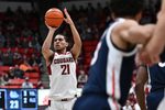 Jan 15, 2026; Pullman, Washington, USA; Washington State Cougars guard Ace Glass Lll (21) shoots a three-point basket against the Gonzaga Bulldogs in the first half at Friel Court at Beasley Coliseum. Mandatory Credit: James Snook-Imagn Images