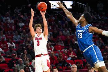 Miami (OH) RedHawks guard Luke Skaljac (3) hits a shot from three point range in the first half of a NCAA men’s basketball game between the Miami RedHawks and Buffalo Bulls, Saturday, Jan. 17, 2026, at Millett Hall in Oxford, Oh.