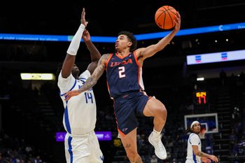 Jan 18, 2026; Memphis, Tennessee, USA; UTSA Roadrunners guard Austin Nunez (2) shoots against Memphis Tigers guard Hasan Abdul Hakim (14) during the second half at FedExForum. Mandatory Credit: Wesley Hale-Imagn Images