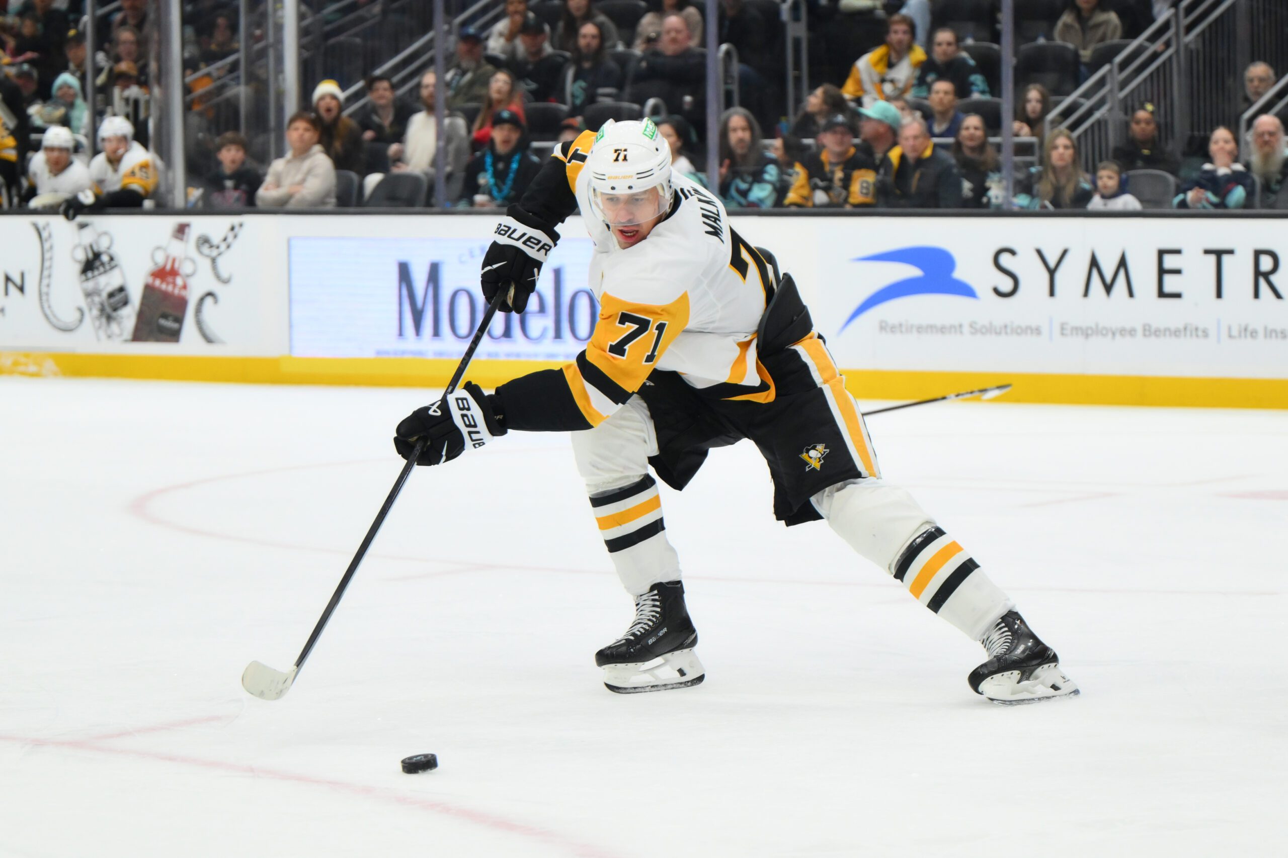 Jan 19, 2026; Seattle, Washington, USA; Pittsburgh Penguins center Evgeni Malkin (71) passes the puck against the Seattle Kraken during the second period at Climate Pledge Arena. Mandatory Credit: Steven Bisig-Imagn Images